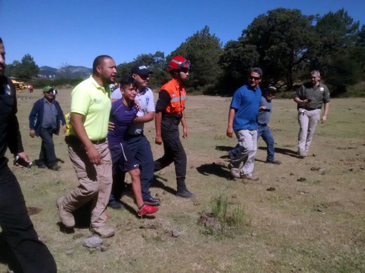 Boy lost in mountains kept alive by awesome dog