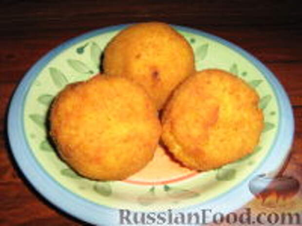 Фото к рецепту: Рисовые "Апельсинки" с соусом Рагу   (Arancini al ragu)