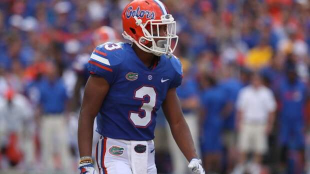Marco Wilson walks onto the field in a game between the Florida Gators and LSU Tigers.