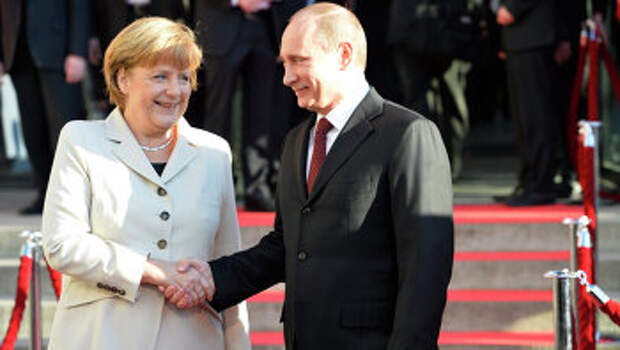 Ангела Меркель и Владимир Путин в Ганновере на открытии промышленной ярмарки