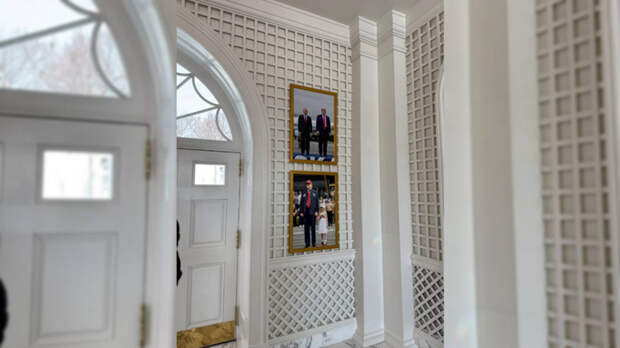 В Белом доме над фото с внучкой президента США появился совместный снимок Путина и Трампа