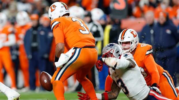 Denver Broncos QB Russell Wilson fumbles