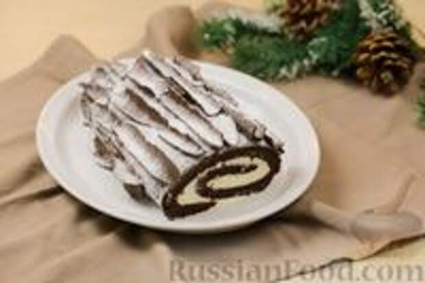 Фото к рецепту: Шоколадный бисквитный рулет со сливочным кремом Фото к рецепту: Шоколадный бисквитный рулет со сливочным кремом