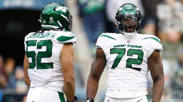 Jets DE Michael Clemons and Jermain Johnson II