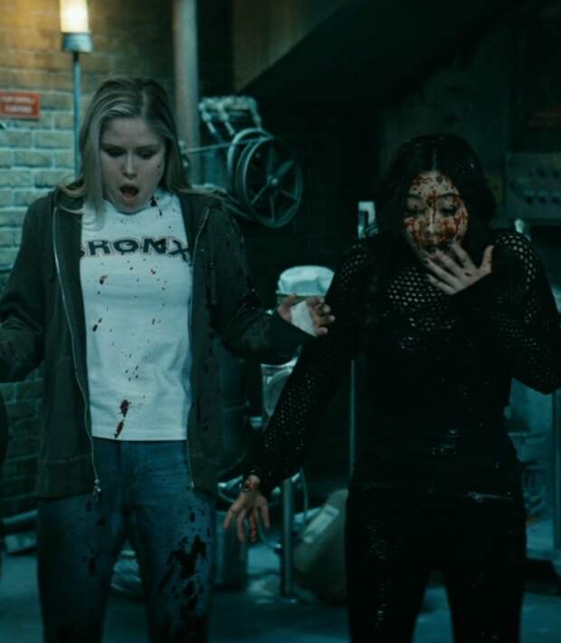 Annie and Kimiko covered in blood.