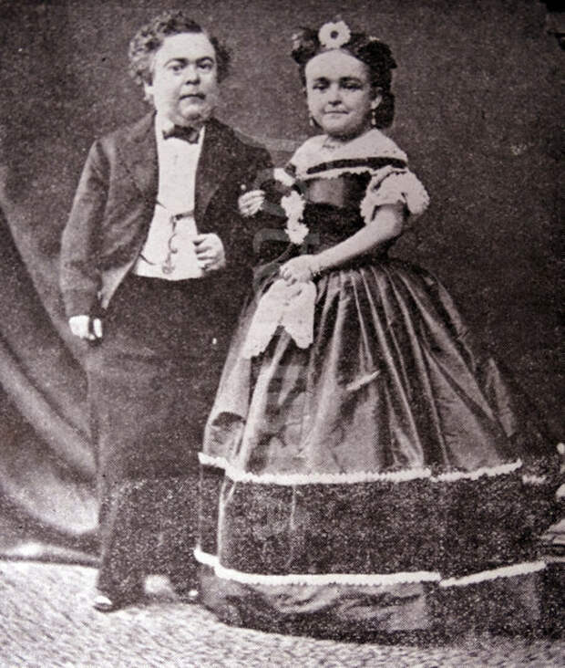 https://gb.fotolibra.com/images/previews/1436883-famous-dwarf-charles-stratton-1838-1883-general-tom-thumb-and-his-tiny-wife-lavinia.jpeg
