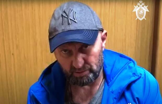 Пойманного в Митине киллера под усиленной охраной перевезли в Лобню