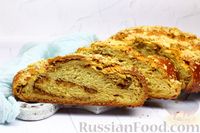 Фото к рецепту: Сдобная апельсиновая плетёнка с ореховой начинкой