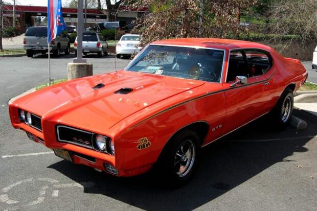 GTO Judge 1969 года. Максимальная скорость – 213 км/ч, а до сотни эта красотка разгоняется за 5,2 секунды. GTO Judge 1969 года. Максимальная скорость – 213 км/ч, а до сотни эта красотка разгоняется за 5,2 секунды. олдтаймер, ретро автомобили