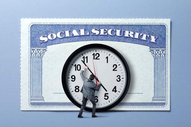 Someone turning a clock in front of a Social Security card.