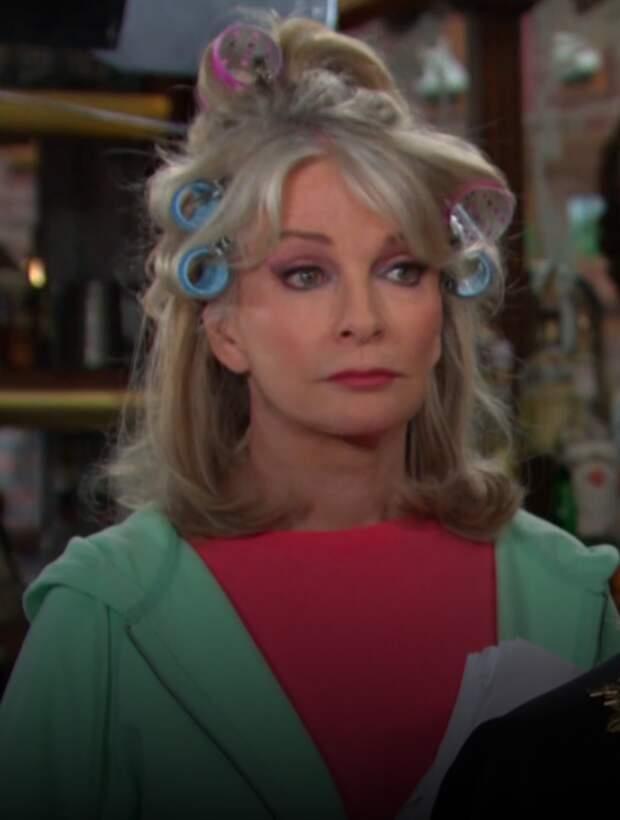 Hattie in rollers and looking upset on Days of Our Lives