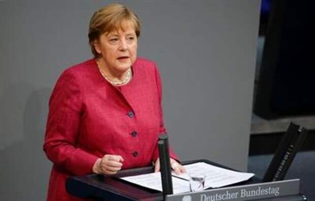 German Chancellor Angela Merkel speaks during a session of the lower house of parliament Bundestag debating the coronavirus disease (COVID-19) measures, in Berlin, Germany, April 16, 2021. REUTERS/Michele Tantussi