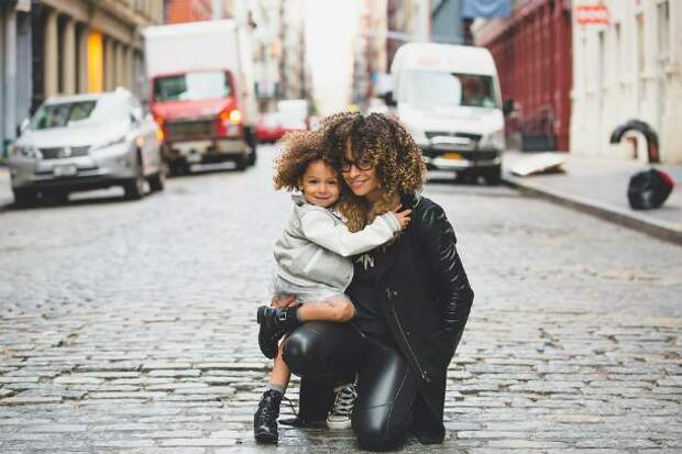 woman-with-child-610x407