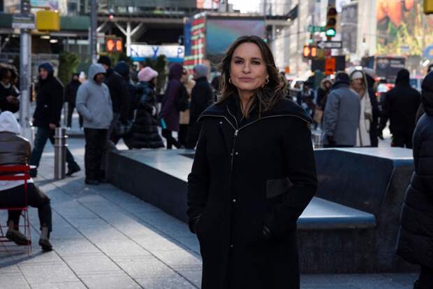 Benson walking through Times Square in her black coat on Law & Order: SVU Season 26 Episode 14