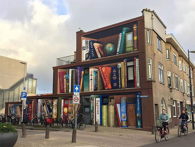 Блог - В Утрехте художники превратили жилой дом в гигантский книжный шкаф В Утрехте художники превратили жилой дом в гигантский книжный шкаф