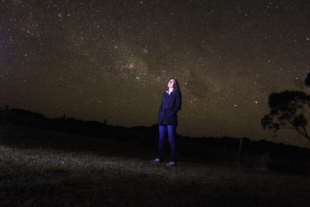 This is Dr. Katie Mack, a theoretical astrophysicist from Australia. Her research focuses on understanding the basic building blocks of the universe, like black holes and dark matter and other concepts that make most people's heads hurt.