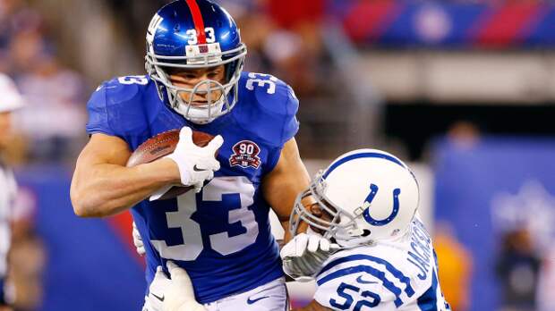 Peyton Hillis runs the ball.