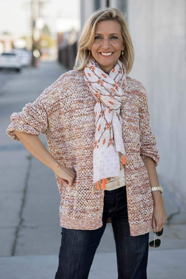 A spring look styled with a multi colored yarn womens cardigan and scarf