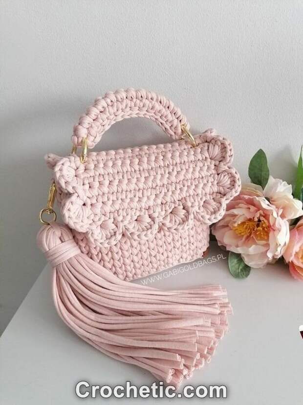 Вязаные косметички и органайзеры, созданные при помощи крючка, стали популярным и практичным аксессуаром для хранения различных предметов.-35