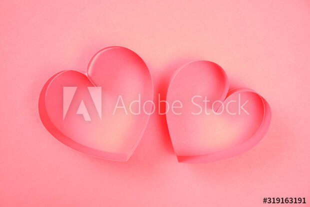 Couple of pink paper hearts on pink background top view. Good love, valentines day, womens day banner, offer, card, invitation, flyer, poster template.