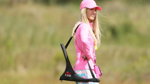 Justine Reed walks the golf course.