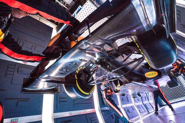 Will somebody hang onto the car... Aston Martin Red Bull Racing’s mechanics pictured performing the Zero-G pitstop aboard an aircraft in Russia.