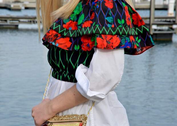 Close up detail shot of an off the shoulder ruffled top.