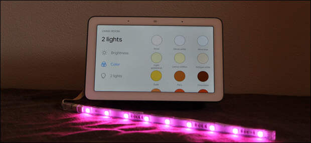 Google Home Hub with led lights in front of it.