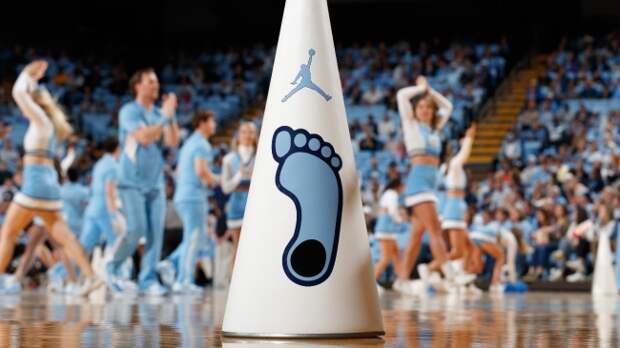 A UNC logo on cheerleading equipment.