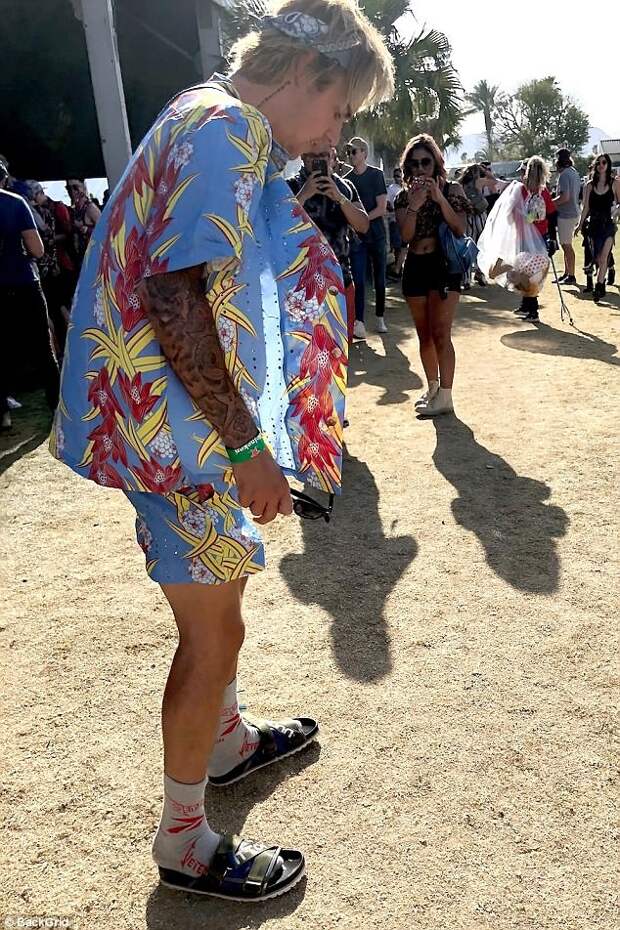 Party time: Justin Beiber landed in Indio, California on Friday ready to take in all the music festival had to offer as he was spotted walking among the lively crowd