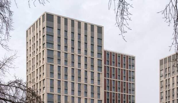 Фасадные работы завершили в двух корпусах жилого комплекса в районе Аэропорт