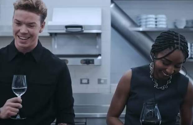 Syd and Luca share a moment in the kitchen during The Bear.