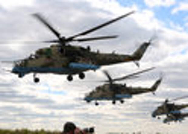 Mil Mi-24 strike helicopters rehearse for the air show