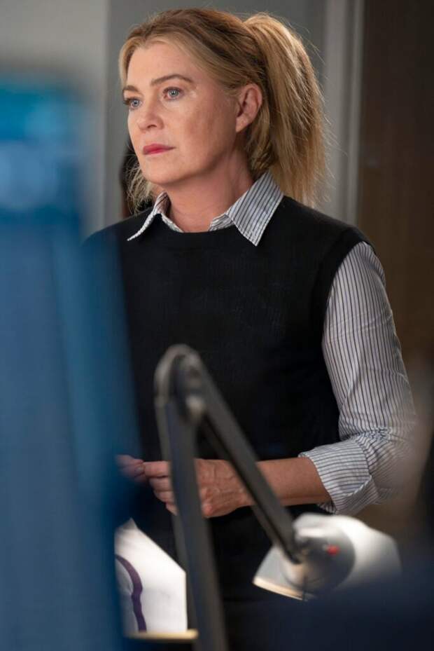 Meredith looks concerned.