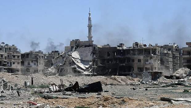 Разрушенные дома в освобожденном лагере палестинских беженцев Ярмук на юге Дамаска. архивное фото