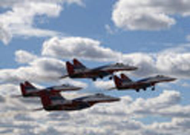 Mikoyan MiG-29 fighter jets of the Strizhi [Swifts] aerobatic team rehearse an air show at the Kubinka air base ahead of a Victory Day military parad
