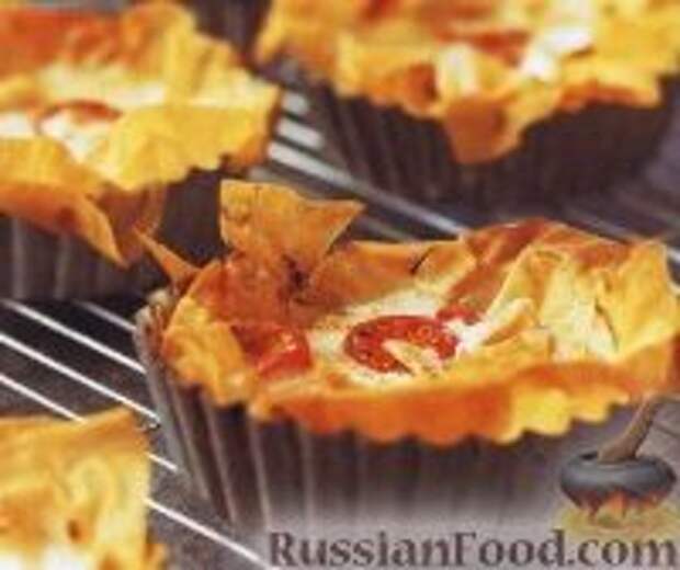 Фото к рецепту: Тарталетки с сыром и рыбой