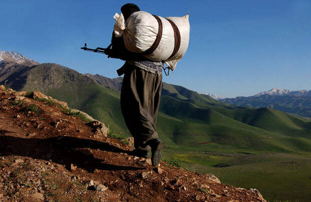 A Kurdish Peshmerga soldier takes to the Zagros mountains to fight an Al Qaeda splinter group, Ansar al Islam, along side US Special Forces.