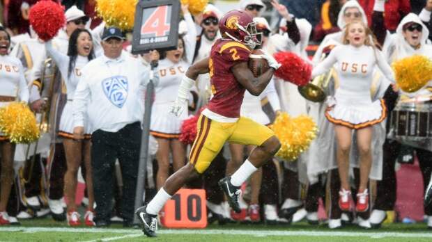 USC's Adoree Jackson returns a punt in the rain against Notre Dame.