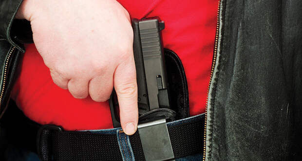 person holding gun