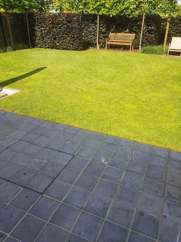The Shadow Of My House Goes Excactly As Far As The Tiles Go