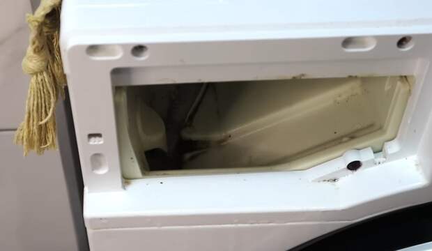 Чем почистить стиральную машинку,  чтоб белье было всегда свежее и чистое