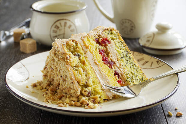 Homemade cake with nuts, poppy seeds and raisins.