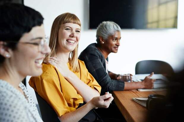 Diverse group of employees in an office setting.