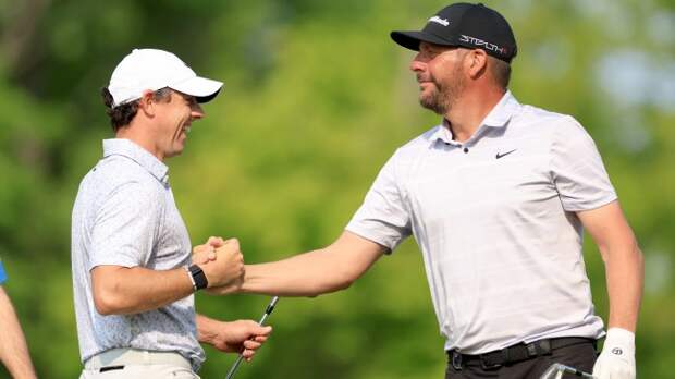 Michael Block and Rory McIlroy shake hands at the PGA Championship.