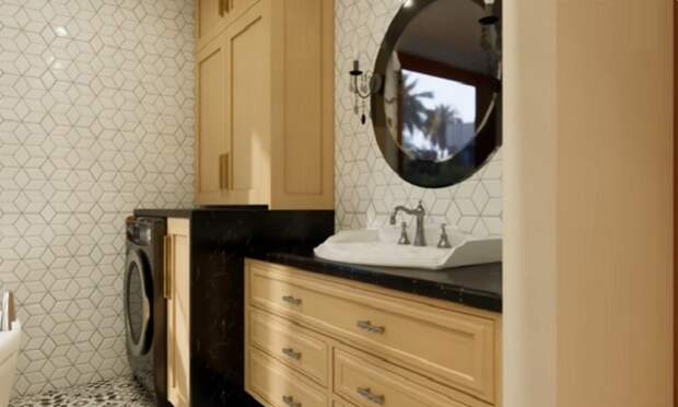 В ванной комнате контейнерного дома нашлось место для размещения стиральной машины и сушилки. | Фото: youtube.com.