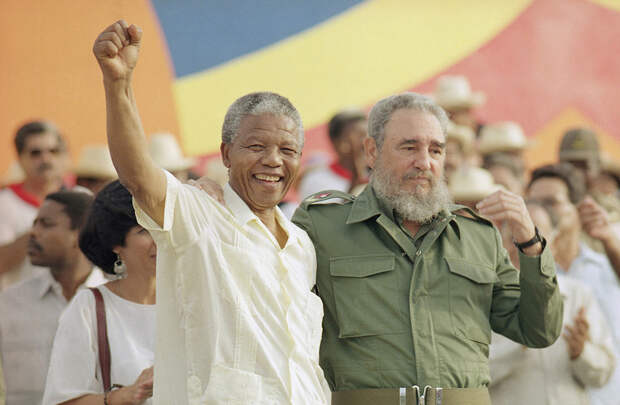 Associated Press Nelson Mandela with Cuban President Fidel Castro, right, during a celebration of the Day of the Revolution in 1991.jpg