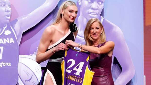 cameron brink holding her la sparks jersey at the draft