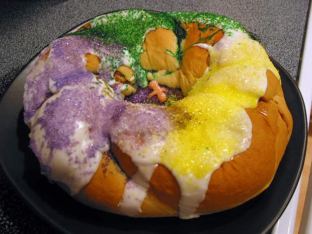 King Cake, replete with a baby in the middle. (Usually, the baby is inside the cake, though.)