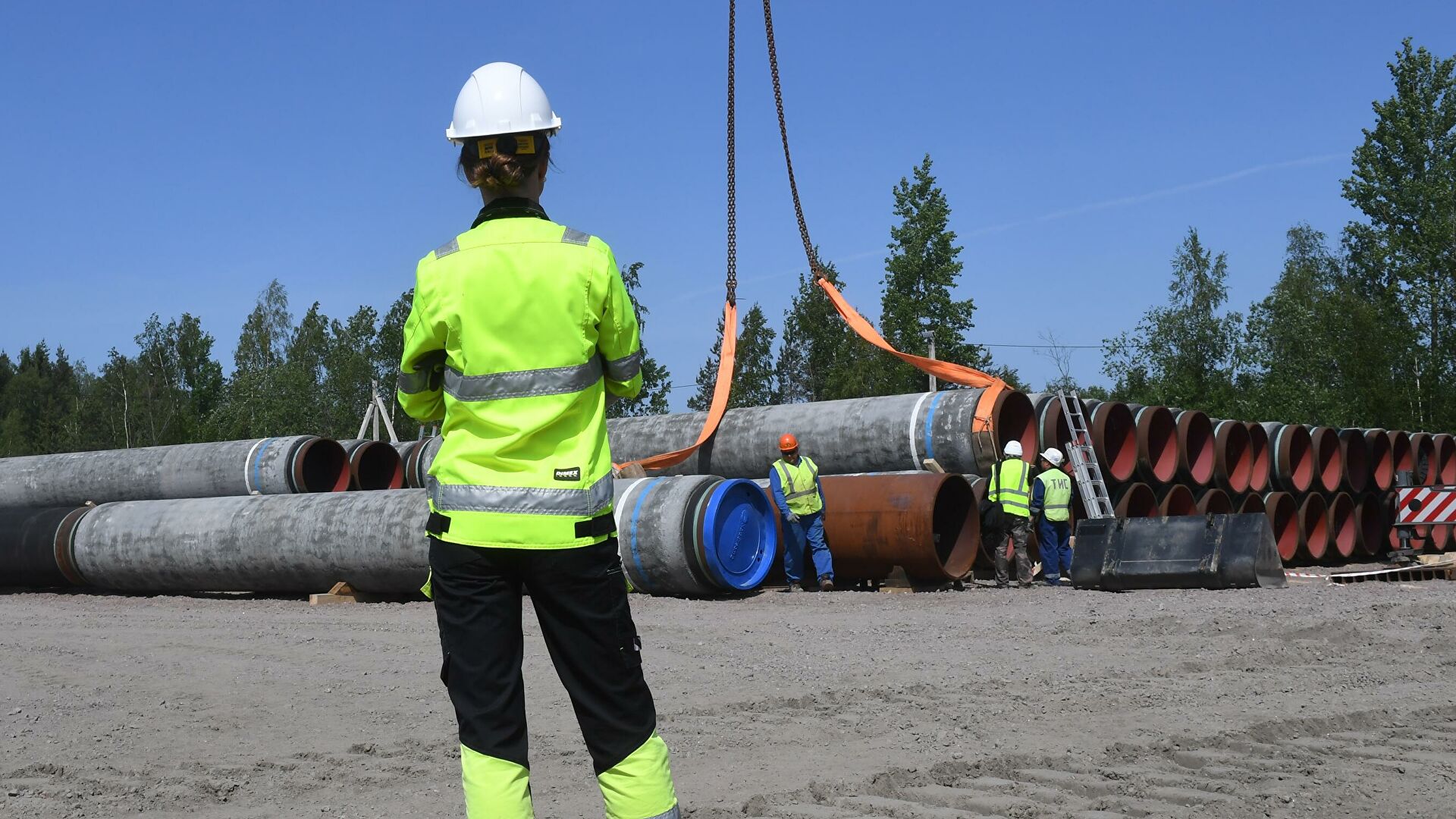 Рабочие на участке строительства газопровода Северный поток-2 Рабочие на участке строительства газопровода Северный поток-2 - РИА Новости, 1920, 27.09.2021